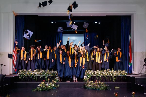 Graduates toss caps